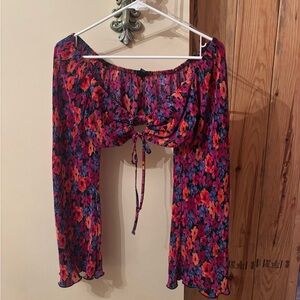 Colorful summer top with flared sleeves